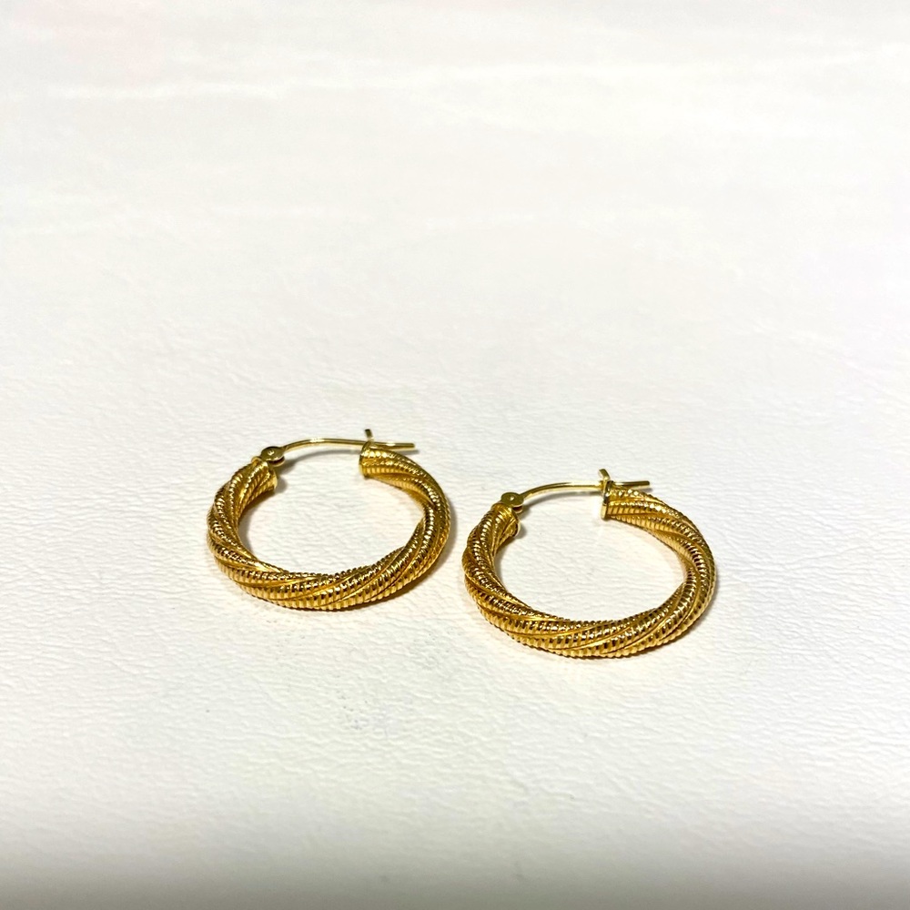 14k yellow gold hoops.